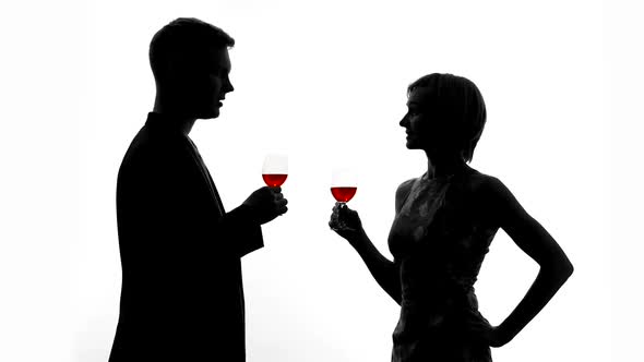 Young Man Toasting Girlfriend, Friends Clinking Glasses Birthday Party, Alcohol