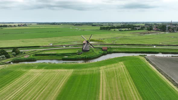 Historic Traditional Typical Dutch Old Windmills Mills on the Rural Countryside in Green Nature