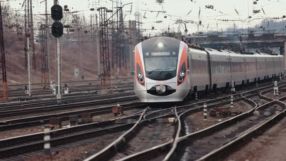 Beautiful Railway Station Modern Suburban Train at Colorful Sunset