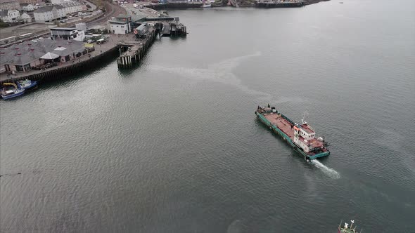 Aerial of a Ship in the Bay Near the Oban Ferry Terminal in Scotland