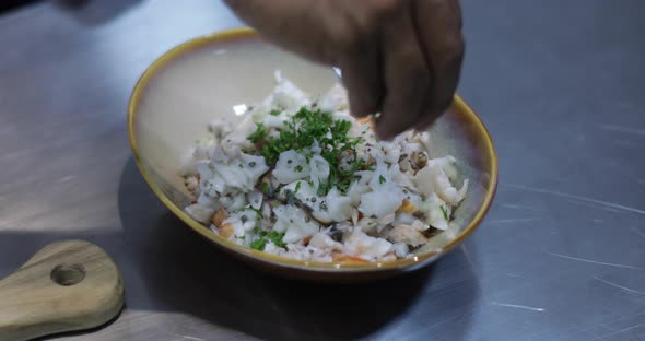 Adding Spices To Dish