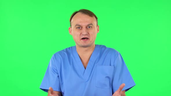 Very Surprised Medical Man with Shocked Wow Face Expression. Green Screen