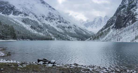 Snow Mountain Lake Timelapse at the Autumn Time