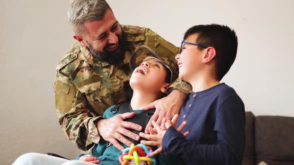 Happy military soldier having tender moment with son kids after homecoming reunion - Love and war co