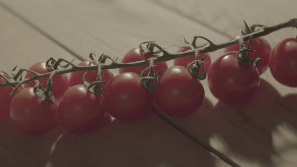 branch of tomatoes on the kitchen table