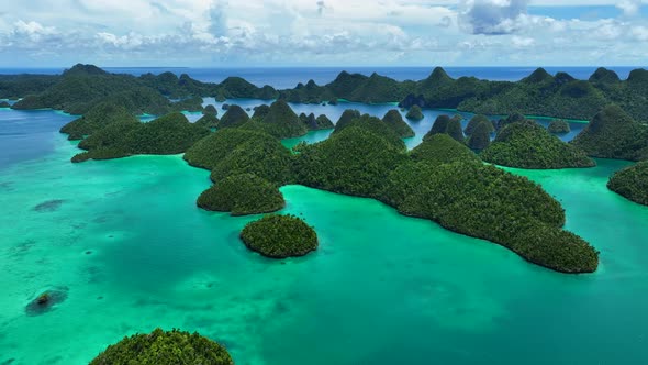 Aerial view of  Wajag Islands archipelago, Raja Ampat, West Papua, Indonesia.