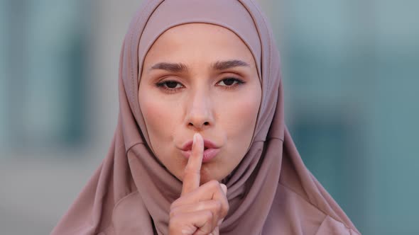 Closeup Serious Female Face Portrait Outdoors Young Muslim Islamic Woman in Hijab Stands on Street