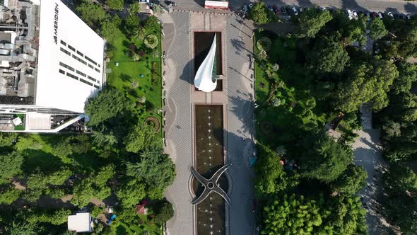 Aerial view of wedding palace and fountains near Technological university tower