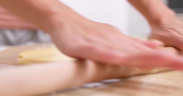 Woman making Christmas cookies at home 