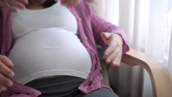 Pregnant Couple Feels Love and Relax at Home