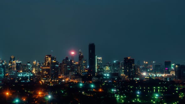 Time Lapse Night Cityscape and Highrise Buildings in Metropolis City Center