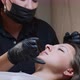A Microblading Master is Measuring Woman's Eyebrows - VideoHive Item for Sale