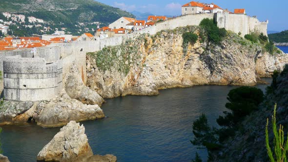 Wide shot of the cliffs and walls of Dubrovnik.