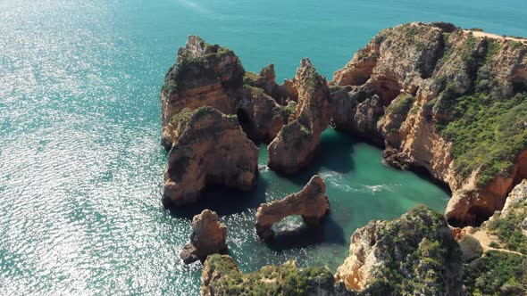 Top view of enclosure of rocky formations in Ponta da Piedade, Algarve, Lagos, Portugal