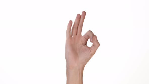 Hand of a Man on a White Background Is an Isolate That Shows the OK Sign. Place To Insert Text or