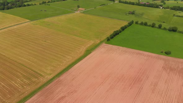 flying over colorful fields and roads