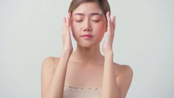 facial beauty skin concept asian female attractive and healthy skin closeup hand touch softy face