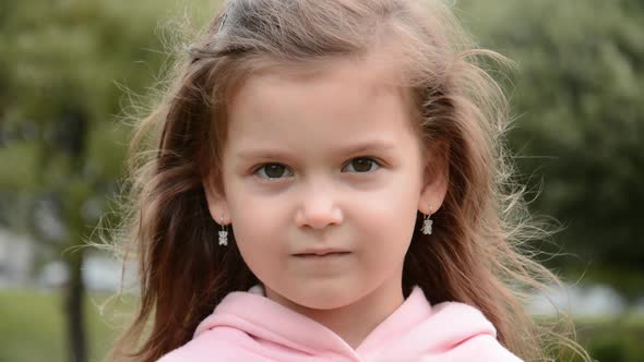 Portrait of Cheerful Caucasian Schoolgirl