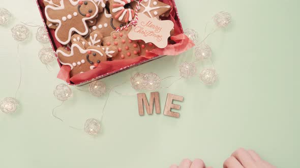 Wood Merry Christmas sign and traditional gingerbread cookies home made.