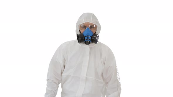 Man Wearing Hazmat Suit Walking on White Background.