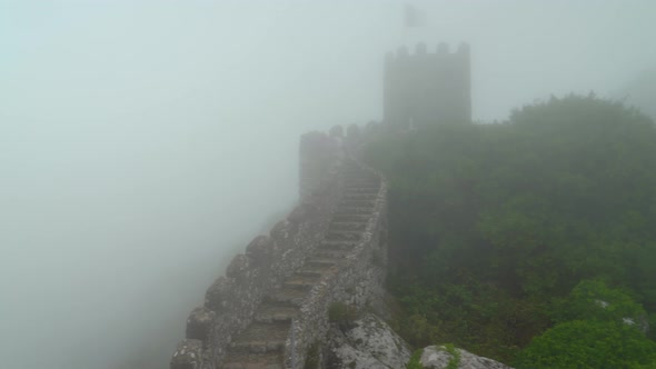 Panoramic View of Moors Castle with Heavy Wet Fog Blowing Through Trees