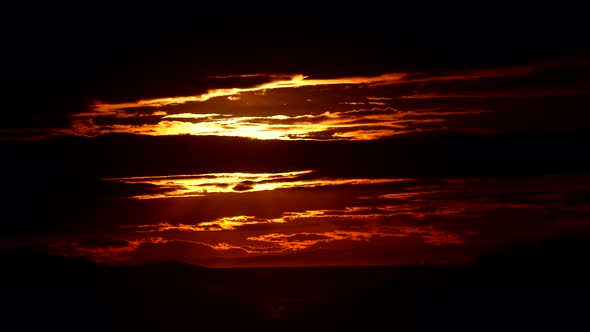 Dark Clouds over Sea at Sunrise, Timelapse