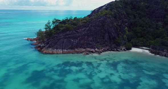 Praslin Island coast, mountain and beach view, Seychelles