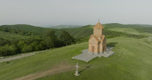 Arc shot of the quiet scenery of the Didgori Valley and the St. George church.