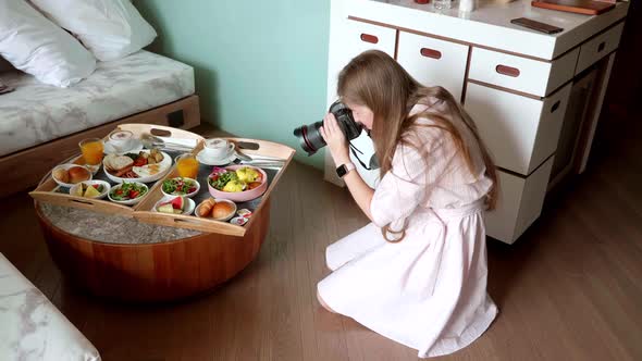 Young Female Photographer Make Photoshoot of Fresh Breakfast in Hotel