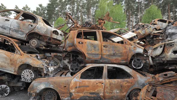 A Lot of Shot and Destroyed Civilian Cars at the Car Cemetery in Irpin Ukraine