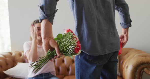 Happy young caucasian couple in love spending valentines day at home