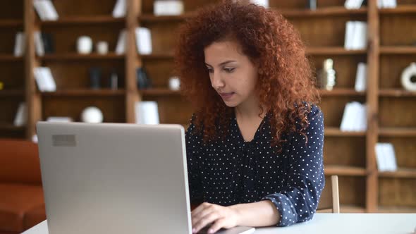 Young Female Office Worker Manager with Curly Hairstyle Feeling Tired