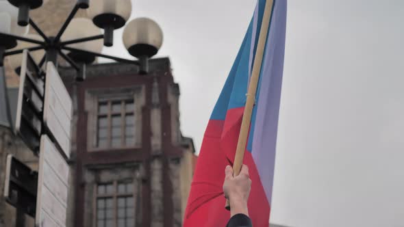 Czech Republic National Flag Waving in Hand of Man, Close Up Slow Motion