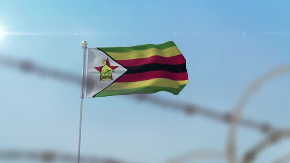 Zimbabwe Flag Behind Border alt