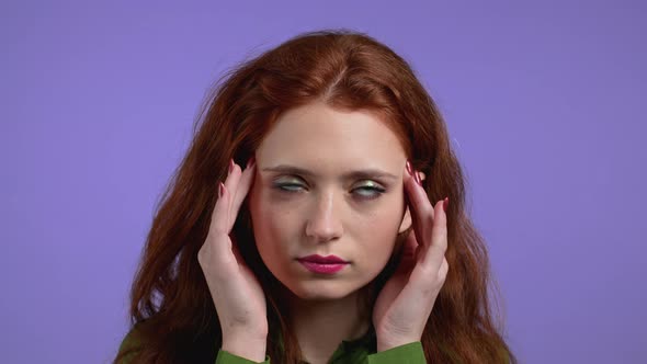 Portrait of Woman Having Headache Violet Studio Portrait