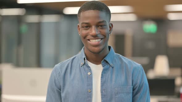 Young African American Man Showing Yes Sign By Shaking Head