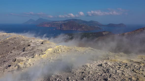 Volcanic Gas Exiting Through Fumaroles on Fossa Crater of Vulcano Island. View on Lipari Islands