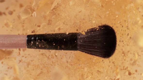 Super Slow Motion Shot of Makeup Brush and Brown Powder Explosion at 1000 Fps