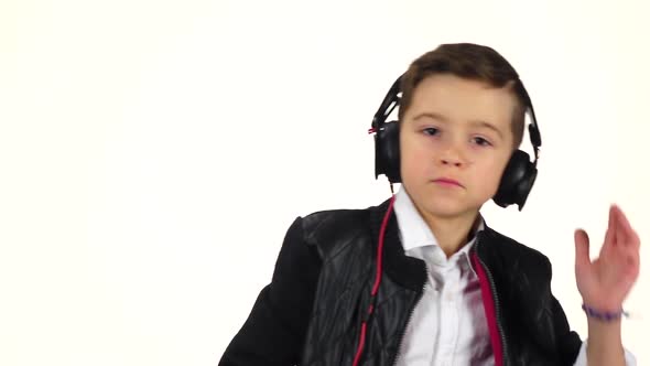 Cute Kid Listens Music on Headphones and Dances, Slow Motion alt