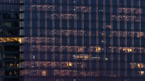 Time Lapse Evening to Night Office Windows Light in Business Center Building Facade