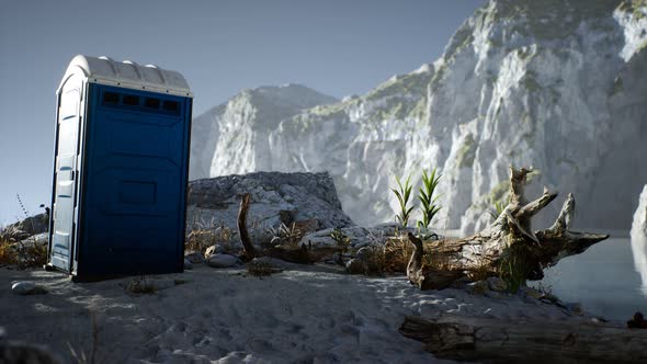 Portable Mobile Toilet in the Beach. Chemical WC Cabin