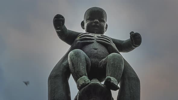 Gustav Vigeland Nude Sculpture Of A Woman Holding Up A Child In The Air - Frogner Park In Oslo, Norw