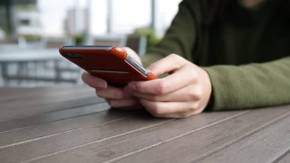 Woman using cellphone for text message