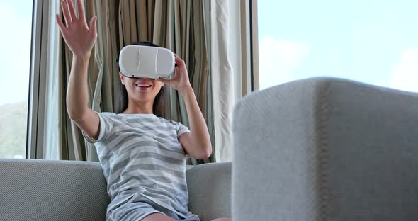 Woman watching virtual reality device 