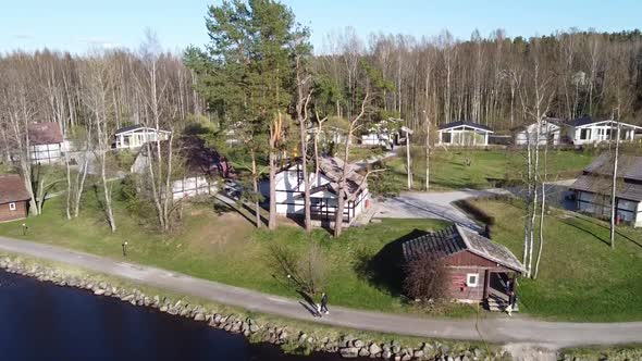 Aerial View of the Lake Borisovskoye, the Forest and the Settlement in Autumn Day, Borisovo