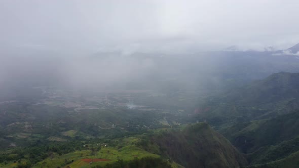 Mountain Peaks are Covered with Rainforest and Clouds