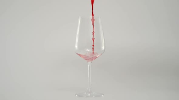 Slow Motion of Pouring Red Wine in Glass at 1000 Fps