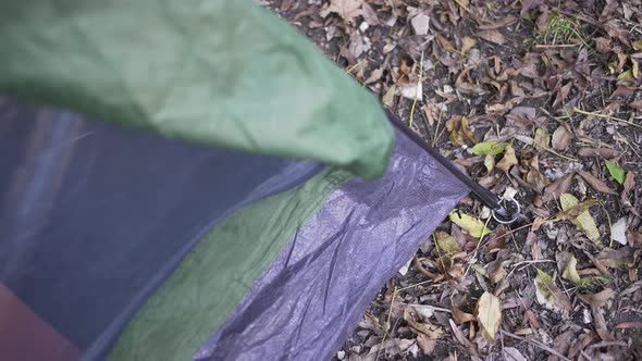 Setting Up a Tent in the Forest