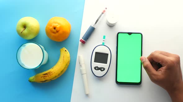 Diabetic Measurement Tools and Person Hand Using Smart Phone