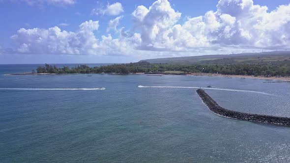 Aerial view of two watercraft passing at Waialua bay in Hale'iwa Oahu
